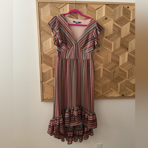 Eva Franco Dresses & Skirts - Eva Franco multi-colored dress with fluttered sleeves and hem